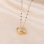 Heartfelt Elegance: Hip Girl Pearl Heart Shell Necklace for Women - Image 4