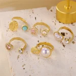 Chic Radiance 18K Gold Plated Pearl Iced Ring - Image 3